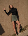 Hendrix Mini Skirt by Le Superbe in army green, detail view