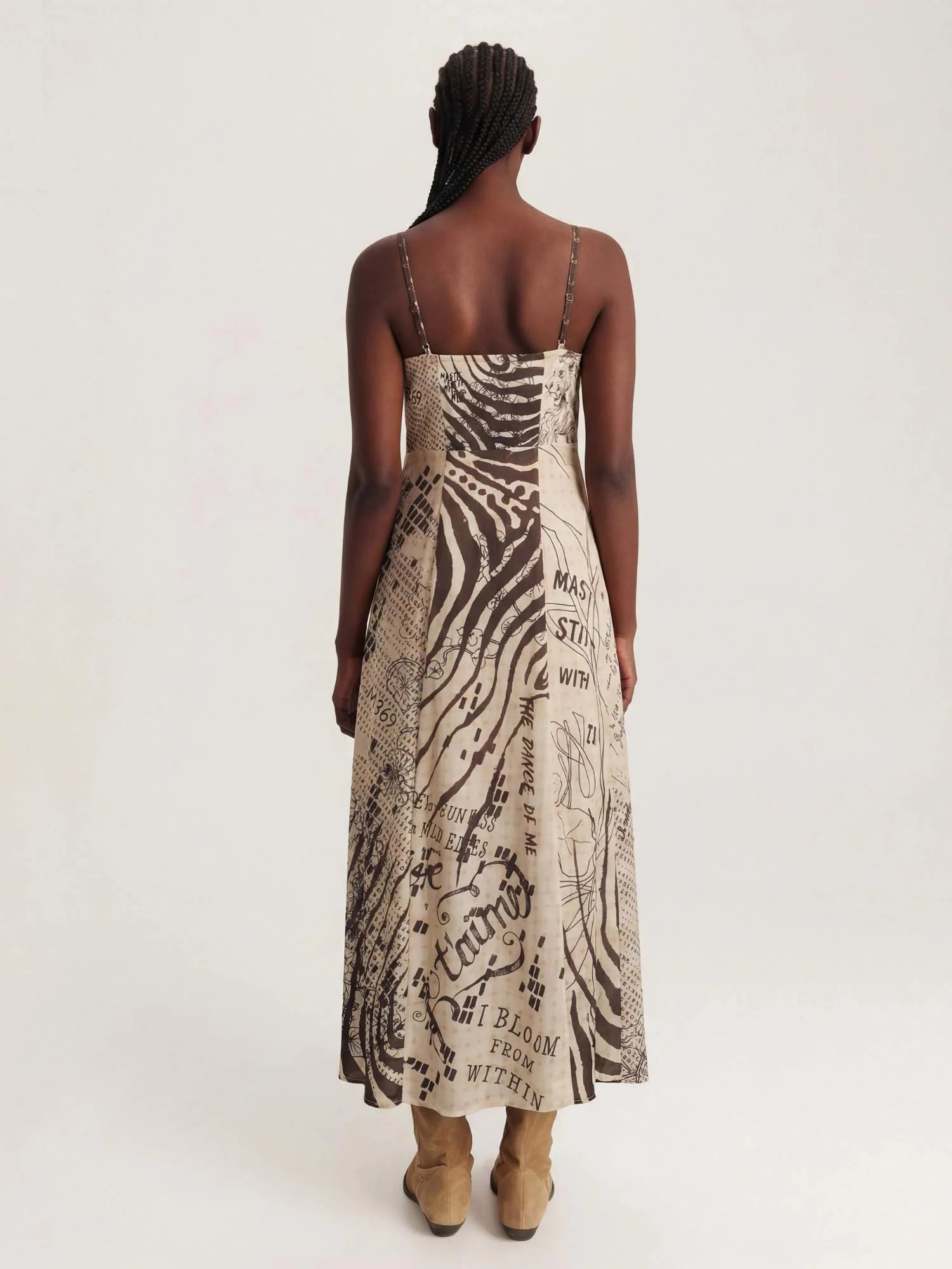 Noir Muse Corset Dress by ME369 in black and white polka dot and script print, detail view