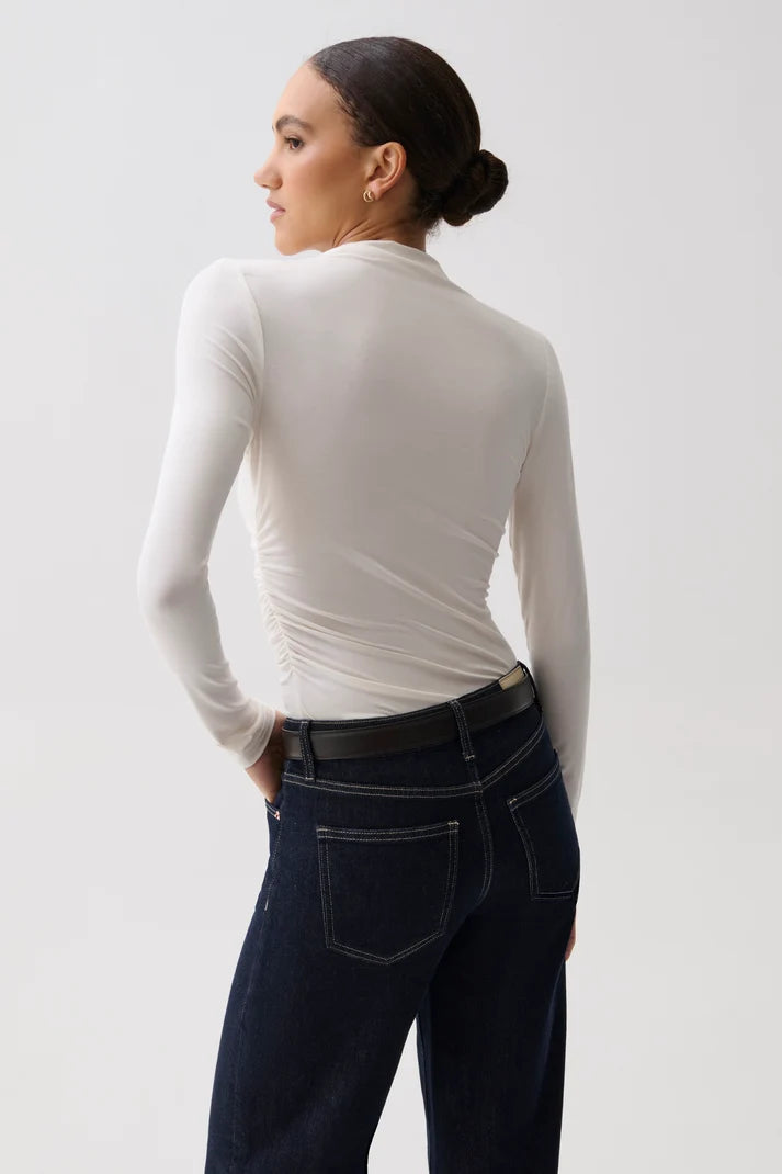 Nathalia Draped Mock Neck Top by Pistola in soft white, styled view