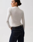 Nathalia Draped Mock Neck Top by Pistola in soft white, styled view