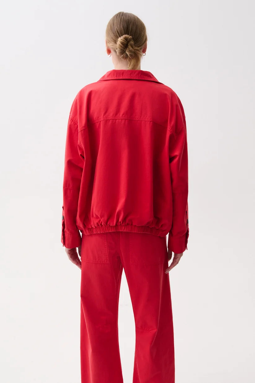Liberty Funnel Neck Jacket by Pistola in Negroni red, styled view