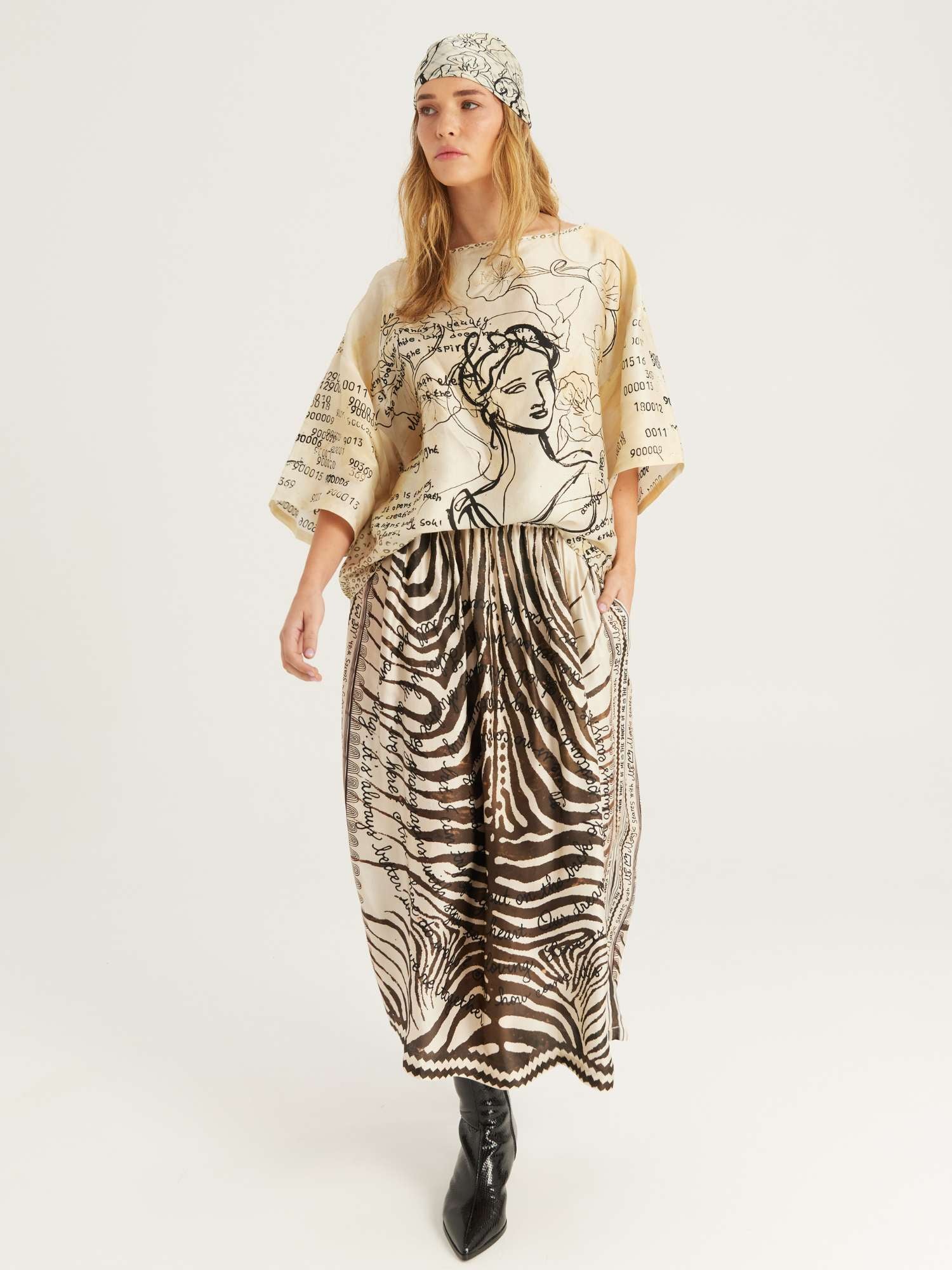 Vanessa Noir Midi Skirt by ME369 in black and white zebra and script print, styled view